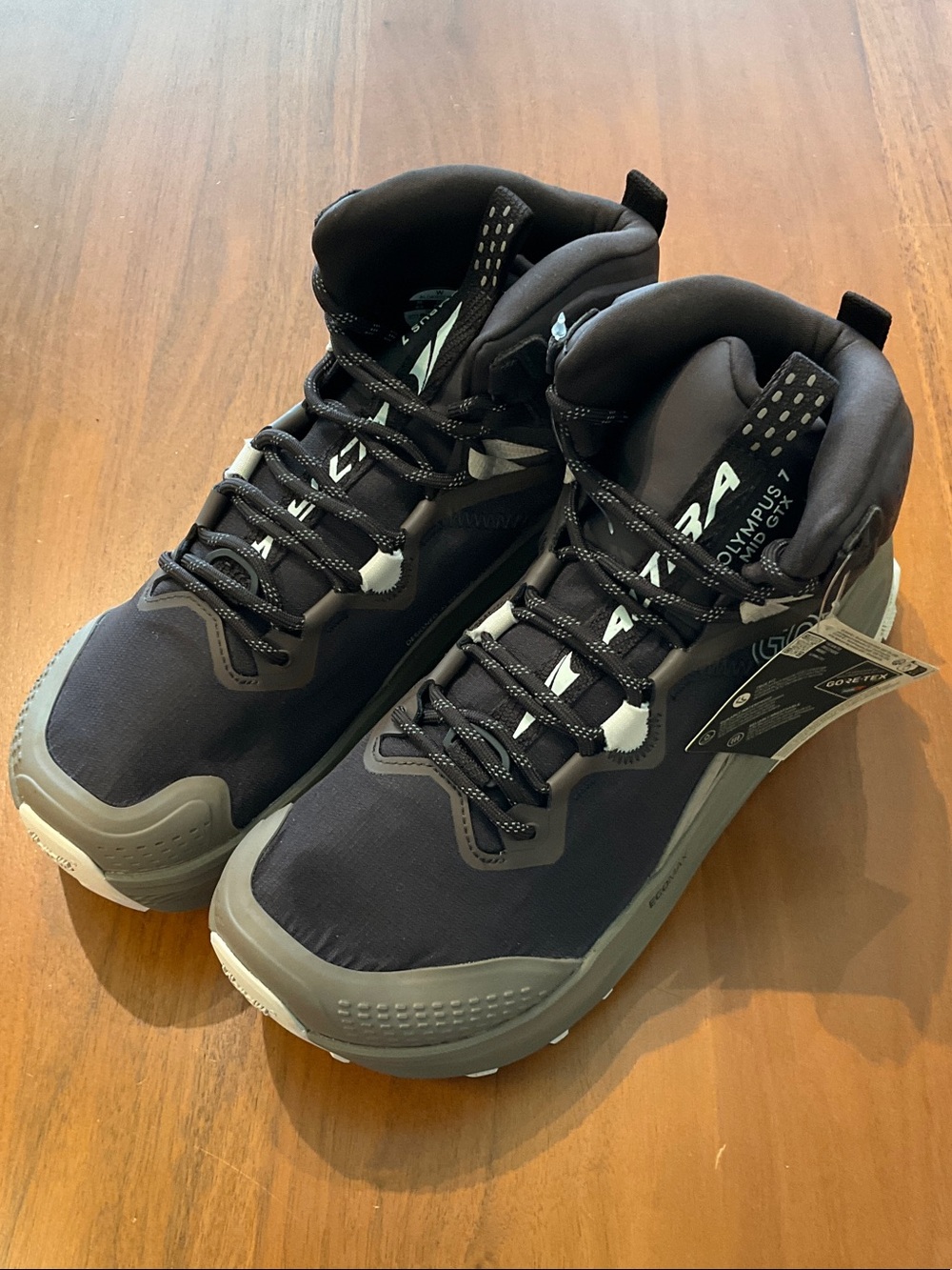 Olympus 7 mid GTX Altra Women's Black and Gray Trail Running Shoes sample